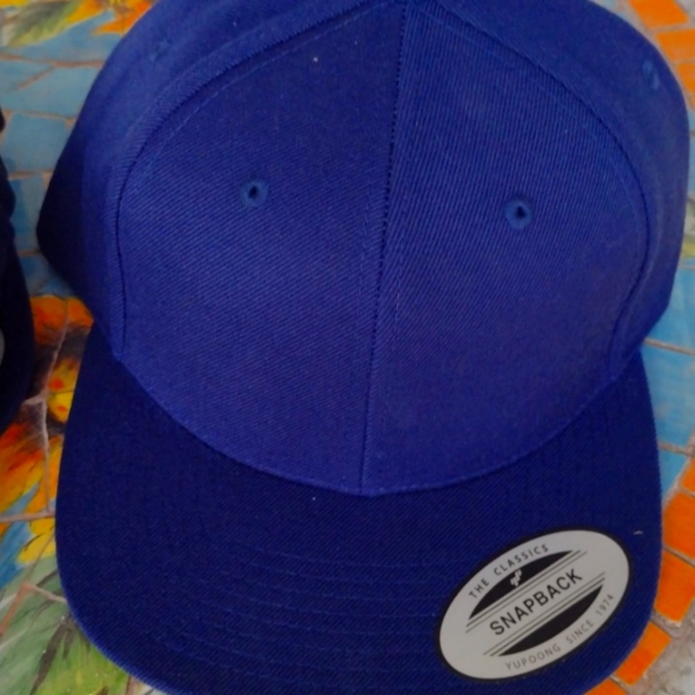 Snap back base ball hats